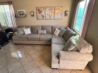 Beautiful Beige Sectional couch from Jerome’s