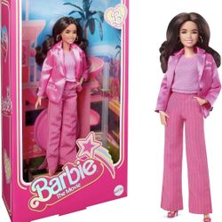 “Barbie the Movie” Collectible doll Gloria Wearing Three-Piece Pink Power Pantsuit with Strappy Heels and Golden Earrings 