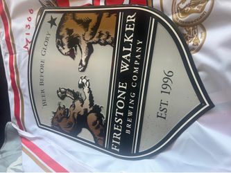 Firestone beer metal sign