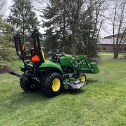 John Deere 1023e Diesel 4x4 Compact Tractor With A Loader And 60 Inch Lawn Mower Deck