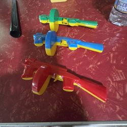 1950s Plastic Tummy Guns 