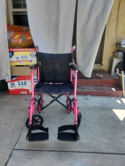 Pink transport chair