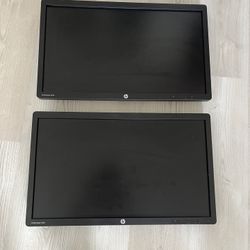 Two 23inch HP Monitors