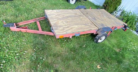 Trailer 4x8 , tilts & folds in half