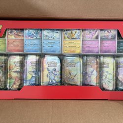 Pokemon Prismatic Evolutions 8 Mini Tins with Promo Cards