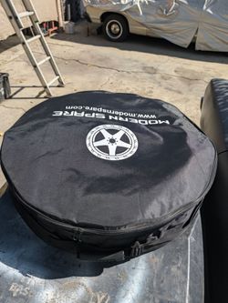 Tesla Model 3 Modern Spare full kit, New. Fits all Tesla Model 3 years and trims.