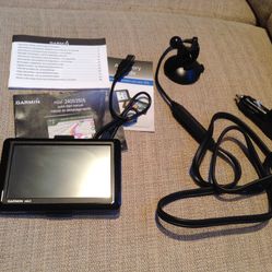 Garmin navigation with charger, manual and accessories. Perfect condition.