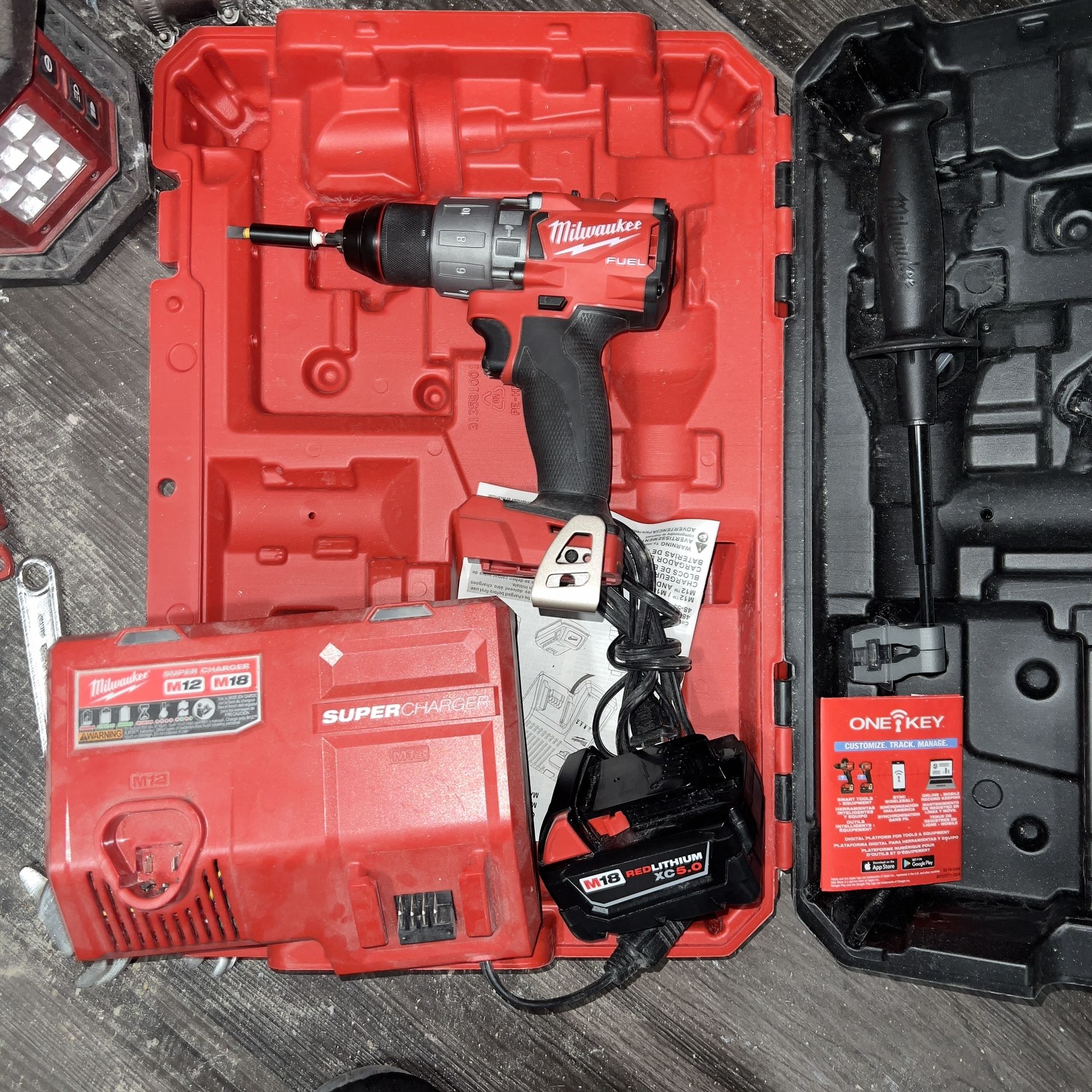 Milwaukee Hammer Drill, XC 5.0 Battery, And Super Charger