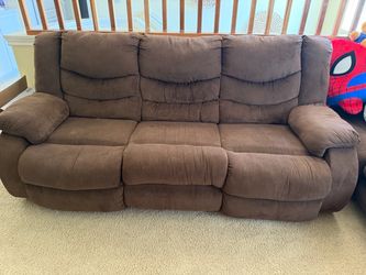 Chocolate reclining sofa by Ashley - set of 2