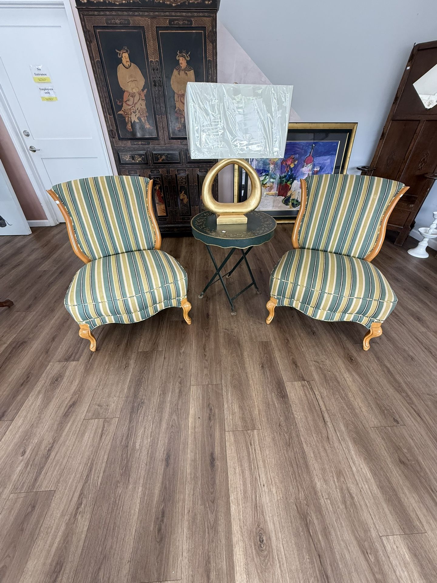 2 T.H. Robsjohn-Gibbings chairs covered in Lou Lou de la Falaise fabric With carved legs