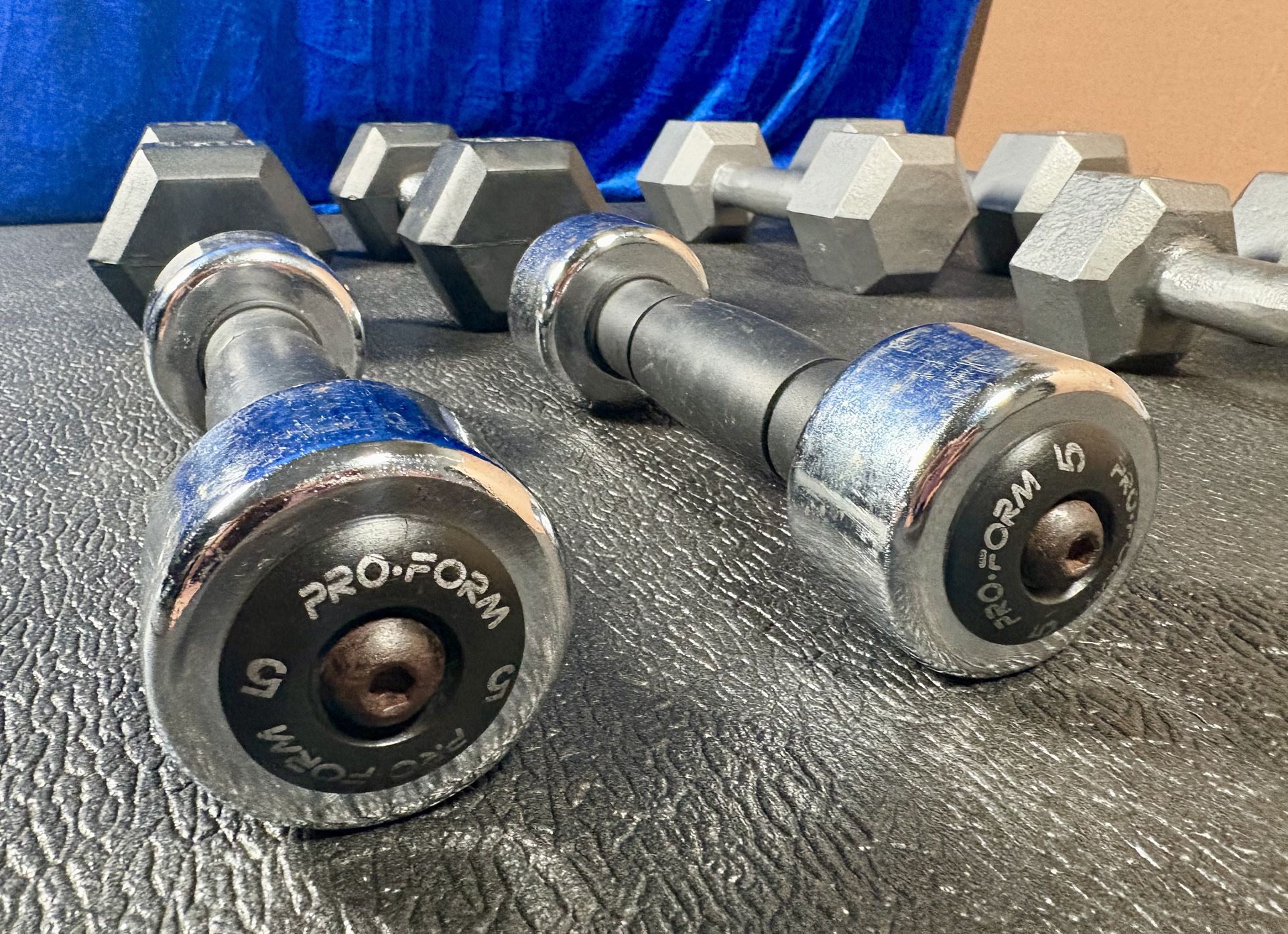 Set of Hex Cast Iron Dumbbells ( light) 12#, 10#, 8# and 5 # In total: 70 pounds.