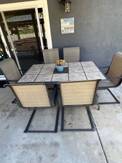 Patio table and 6 chairs