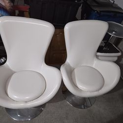 To Identical Egg Chairs With Two Identical Ottomans