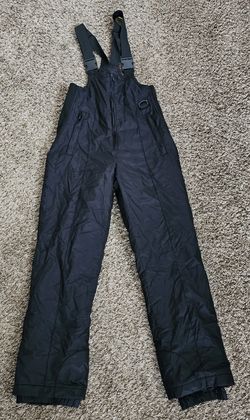 Unisex Sport Essentials Snow Pants Sz 14 Black Zip Up Buckle Straps youth child overall 

Excellent Pre-owned condition,  used a few times
Size 14 you