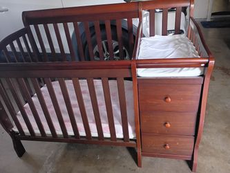Crib with changing table