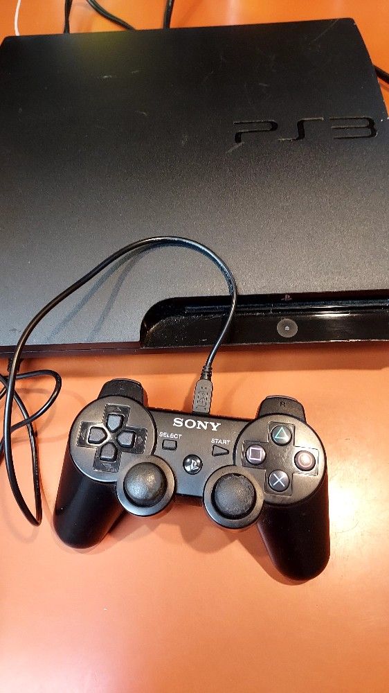 PS3 With 10 Games And 1 Controller And All Cords 