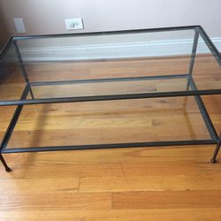 Two tier black framed glass coffee table 