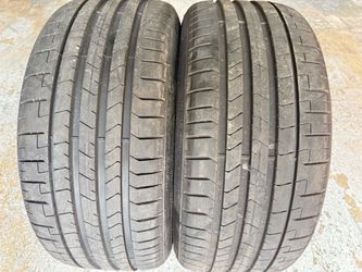Two Tires 235/35/20 Pirelli P Zero PZ4 PNCS like new with 95-99% Left Tesla Model 3