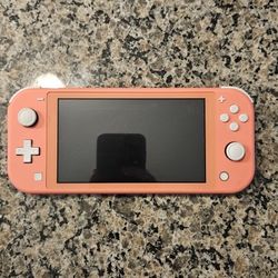 Nintendo Switch Lite Coral Color With Case