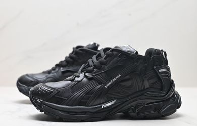 Balenciaga chunky black runner shoes.