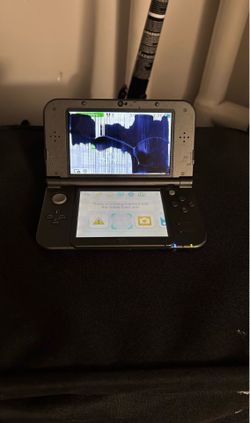 New Nintendo 3DS XL (broken top screen)