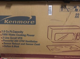 Under cabinet microwave. New in box