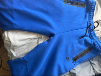 Blue Nike tech Sweats