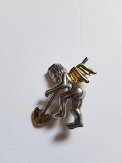 Cupid Pin/brooch Silver and hints of gold