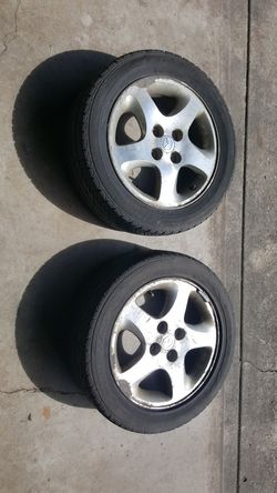 Mazda alloy wheels & tires 15 inch- $30 OBO