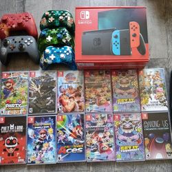 BIG NINTENDO SWITCH BUNDLE WITH GAMES , CONTROLLERS & MORE !
