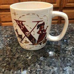 Disney Parks Mug Cup “X” Is For X Marks The Spot, Pirates of the Caribbean.  ABC Disney letters cups.  Size 4 inches Tall and 3 1/2 inches wide across