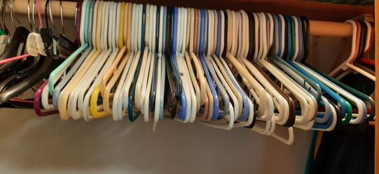 20 plastic tubular hangers $1.