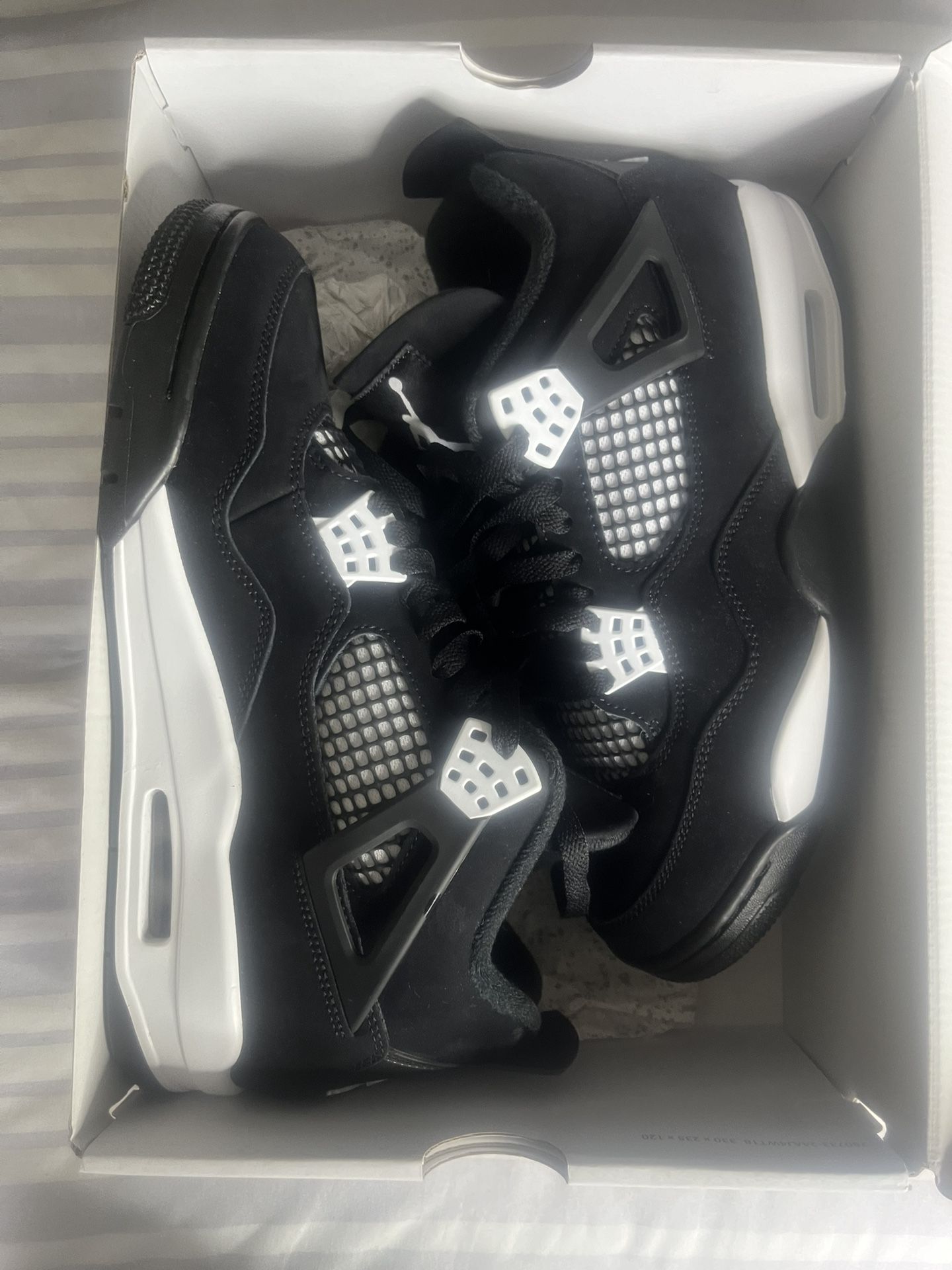 Air Jordan 4 “White Thunder” (Size 9)