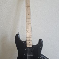Squier Stratocaster And Fender Amp LT 25