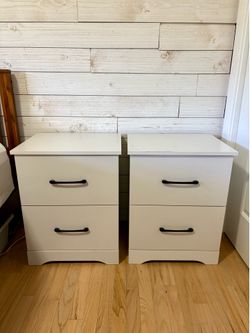 Two white nightstands/end tables