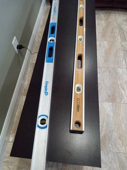 Two Levels For Sale One 6'14-ft One's An Empire Magnetic Aluminum Other 40 Bucks For The Pair