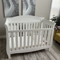 Delta Children Lancaster 4-in-1 Convertible Baby Crib, Bianca White