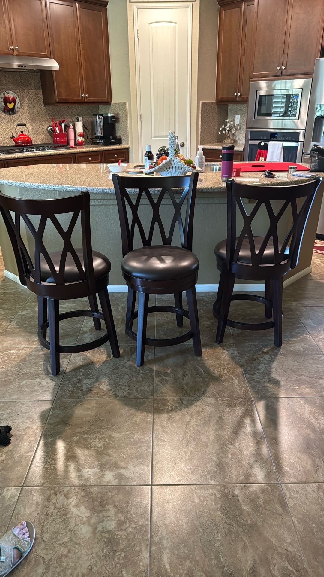 3 Brown Swivel Bar Stools