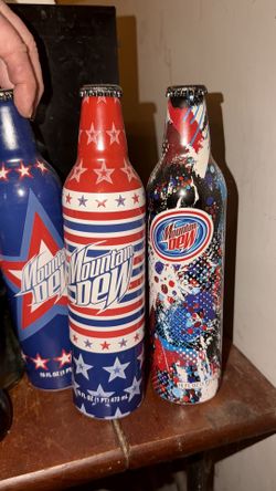 collectible Mountain Dew Bottles And Collectible Coca-Cola Glass Bottles