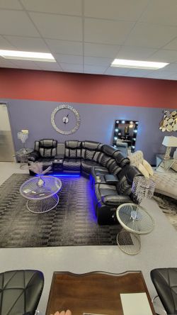 Avian Leather Reclining Sectional With Built In Bluetooth Speaker And LED