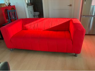 bright red loveseat couch