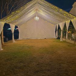 Draped Tents And Twinkle Lights