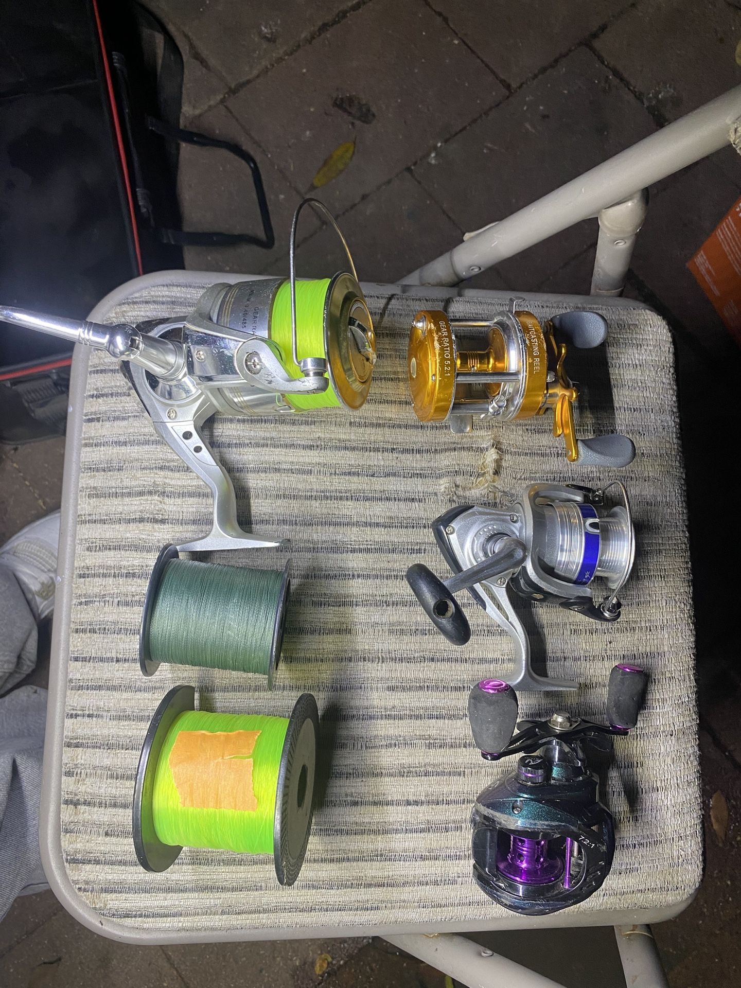 fishing poles  and reels reels ect 