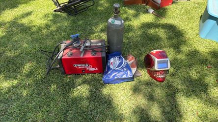 WELDER , tank , mask , gloves . $600