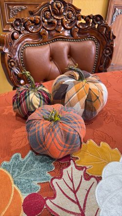 3 pumpkins and 2 pillows cases