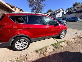 2016 Ford Escape Titanium with 111,352 miles. 2.0L EcoBoost, 4WD. Leather interior, panoramic sunroof, roof rails. 36 service history records on CARFA