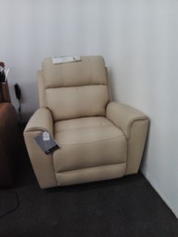Genuine Leather Interior Power Recliner Chair In Beige Color.
