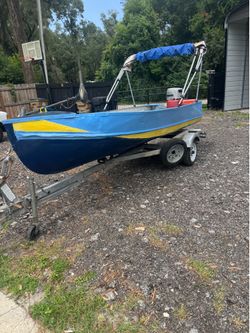 Aluminum V Hull Boat, 30 HP Motor and Trailer