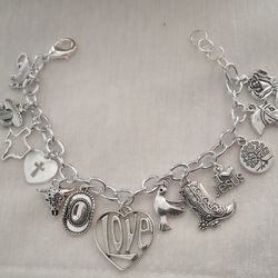 new love charms bracelet it is not james avery or sterling silver my sister makes them