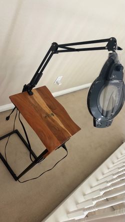 Table with magnifying glass attachment